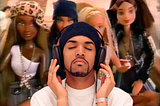 A photo of Craig David photoshopped over a photo of four of the Flavas dolls.