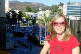 The author in LA with the Hollywood sign in the background