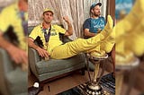 Why are we triggered by Mitchel Marsh’s feet on the Trophy?