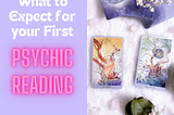 A picture of Tarot Cards on a white cloth, and the blog post title on the side which reads “what to expect from your first psychic reading”