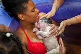 Racial Equity in Birthing: Empowering People of Color with Midwifery Care and Doula Support