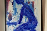 painting of blue figure kneeling with abstract burgendy coloured fire in its hand. Red and blue colours behind.