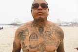Remigio “Mike” Chavez aka Duke Loco, is photographed on Santa Monica Beach in 2022 by David William Reeve.