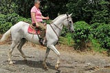 María is ridding her horse ``Bucanero``