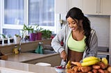 A girl is making a meal with vegetable, healthy food — willtiptop.com