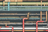 Efficient Pipelines: Lean for Stability, Fat for Innovation