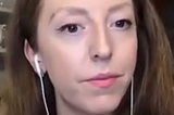 Dr. Casey Means wearing a headset during an interview.