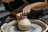 Pottery image creating vases Kavitha the Coach