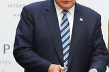 Donald Trump Holds the Scissors (or does he?)