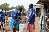 School children in Turkana West undertake a clean-up exercise