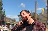 Christopher Hood eats a turkey leg at the Northern California Renaissance Faire
