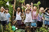 How to teach kids where food comes from — get them gardening