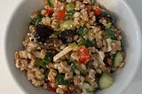 Farro Salad in a white bowl