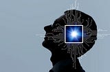 A silhouette of a man’s head with a computer chip superimposed with network wires extending from it. Photo by metamorworks/Getty Images
