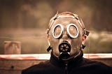 man wearing a gas mask