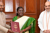 Ram Nath Kovind, the chairman of the high-level committee on One Nation, One Election, presents the report to President Droupadi Murmu, in New Delhi on Thursday.