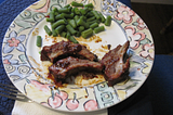 My photo of a delicious barbecued ribs and green beans meal.