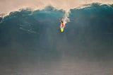 surfer on giant wave
