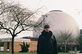 Author David Vilentchik in front of a planetarium in Berlin.