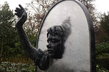 Alice through the looking glass, a 3-dimensional sculpture in Guildford Castle Grounds, close to where Lewis Carroll lived.