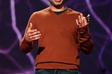Sal Khan giving a Ted talk.