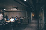 Team working together in an office conference room