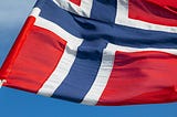 Flag of Norway flying in wind.