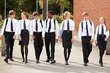 School Uniforms-Forced Conformity? Or Escape from Classism?