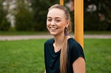 sporty-blonde-girl-smiling-frame-near-football-goal-any-purpose — Un Swede