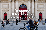 People walking and cycling on a busy day in Denmark
