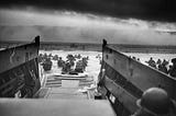 A picture of soldiers exiting a landing craft at Omaha Beach on D-Day