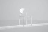 A white chair in a white background