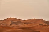 Empty desert landscape devoid of plants or animal life.