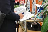 DCWP Inspector writes a violation for price gouging at a store that sells face masks and cleaning wipes.