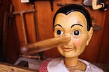 Pinocchio having a long nose.