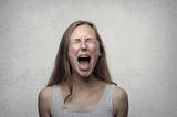 frustrated woman screaming