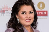 Anna Netrebko, the world famous Soprano after 20 years and more than 200 performances at the MET is fired because she is Russian.