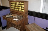 A wooden 1890 tabulation machine with dials.
