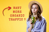 Want more organic traffic? This is the caption on the image with a red arrow pointing to the text and a female drinking juice with a straw hat on.