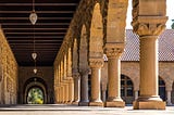 Photo of hallway and columns at Stanford University