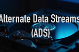 A photograph of a computer hard disk in a dimly-lit background with an overlay text that reads “Alternate Data Streams (ADS)”