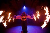 Fire art at Becoming Shades immersive circus show london