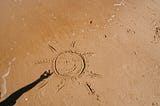 A moment in time drawn in the sand