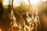 A dreamcatcher to catch those memorable dreams and hold on to them for as long as possible, long after the feelings have faded.