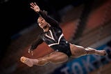 Biles Bows Out