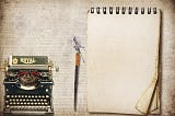 Antique typewriter and a notepad from Carel Kolchinski