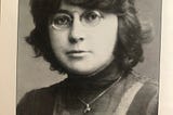 Young Marina Cvetaeva’s portrait. She is wearing glasses.