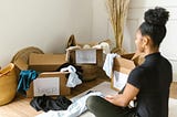 Woman trying to organize her possessions