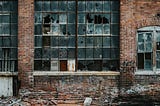 Abandoned building with broken windows