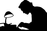 black and white silhouette of man at typewriter